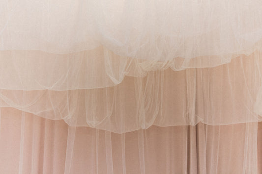 white sheer curtain on window