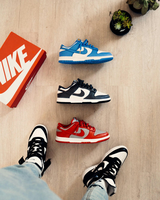 black white and red nike sneakers